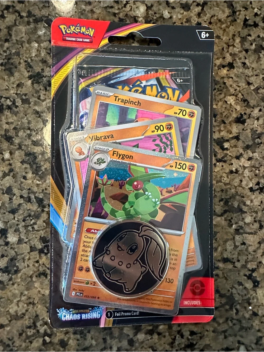 Chaos Rising mega evolution pokemon blister pack with foil promo card and coin